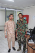 حضور ریاست و کارکنان دانشکده علوم پزشکی تربت جام با لباس بسیجی در محل کار به مناسبت هفته دفاع مقدس